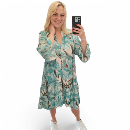 Kleid mit floralem Muster in Türkis